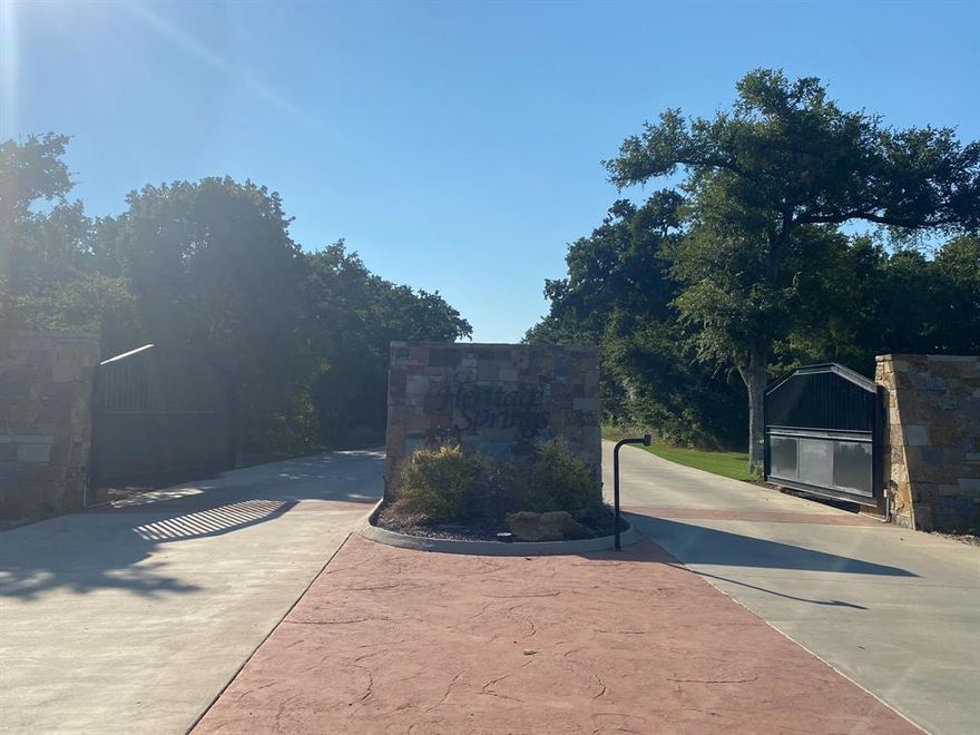 This slightly over 1 acre piece of property is on the right, one lot east of the corner lot after you enter the gated subdivision.  This lot is in the Parker County SUD that includes a water tap through Parker County SUD.  This lot holds no trees and has many possibilities in building the home etc. of your dreams.  It has easy access to I-20 to reach anywhere in the Metroplex at ease.  This hidden gem neighborhood is growing in this gated subdivision that boasts a more private neighborhood than surrounding areas with larger lots.  This lot is not in the 100 yr. flood plain but please see the available contour map attached for verification with the builder so it can assess what the building needs are for this lot.