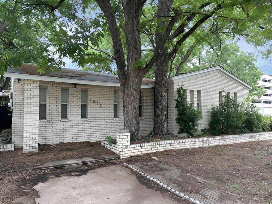 Nestled in the heart of Dallas, this ranch-style brick home offers 5 bedrooms and 2.5 baths, perfect for anyone seeking ample space. The minute you step inside, you're greeted by a large living area, designed for comfort and connection, perfect for entertaining or relaxing with close ones. The open kitchen serves as the heart of the home and opens to a breakfast area ideal for shared meals and creating cherished memories.

The primary suite is situated at the back of your home for extra privacy. The additional four bedrooms offer flexibility, whether you need guest accommodations, a home office, or a hobby space. Two more bathrooms cater to family and guests, ensuring everyone's needs are met with ease.

Outside, the fenced backyard provides a space for outdoor living. The absence of a garage offers an opportunity to customize the property's exterior to fit your vision, such as adding carport parking or expanding outdoor amenities.

This Dallas gem encapsulates potential and is waiting to be transformed into your dream home. Discover the possibilities this property has to offer and make it yours today.