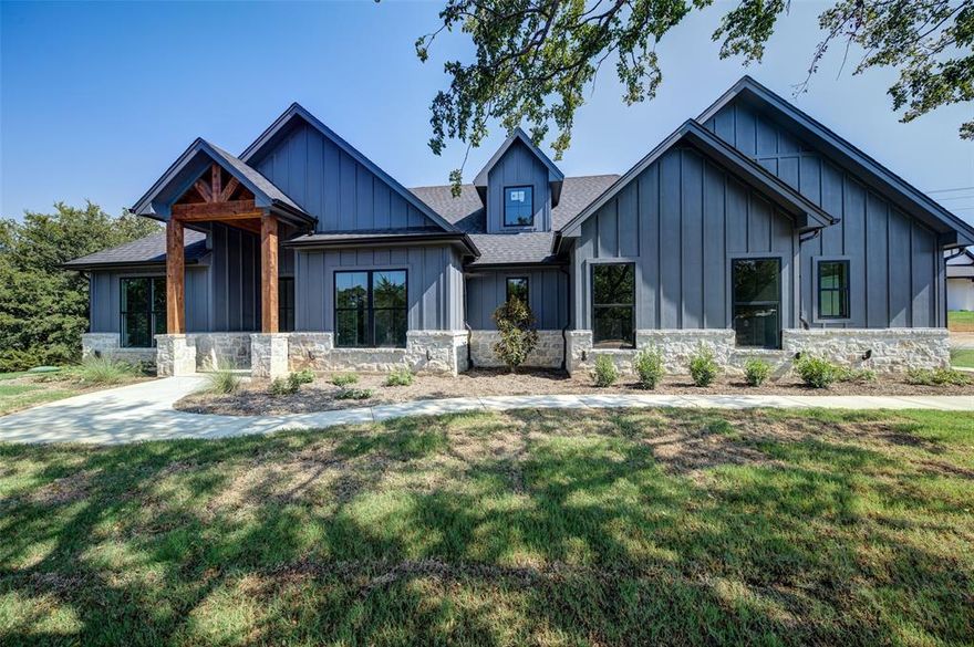 One-of-a-kind nature trail easement to LBJ Grasslands makes this gorgeous stone, board and batten home the perfect escape! Listed as 3 bedroom 2.5 bathroom, spacious floor plan offers flex room with closet and could easily be 4th bedroom. Exterior color scheme of moody gray paint, rock, cedar, and tongue & groove provides curb appeal on 2 acre lot surrounded by big oak trees. The peaceful view of the woods off back porch invites you to the LBJ Grasslands just steps away. Plan offers plenty of storage with walk-in pantry, 2 large linens, walk-in closets, oversized garage, mud area, and custom cabinetry. Open-concept living is warm and inviting with stone fireplace and plenty of natural light. Interior includes upgraded features like soft close cabinetry, floating shelves, all granite counters, tile in wet areas, and LVP flooring. Located less than 3 miles from downtown Alvord on paved roads, the property is only 15 minutes to Decatur or Bowie and a short 45 minute drive to the DFW area!