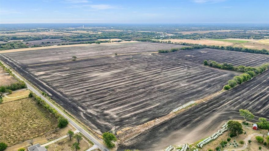 121.75 acre located SE of Van Alstyne off FM 3133 . The tract has frontage in Blackmon Rd  and Milam Rd. SW corner of that intersection  This farm is currently being used a cropland and some hay. The tract has very good fences on the north , south and east boundaries and partial on west. The tract has waterline on the north and east sides as other utilizes also. Waterline is reported as 4 inches, but must be verified with South Grayson water company   Very  nice buy and hold tract or suitable for subdividing into smaller portions  Old homesite on Blackmon would be an ideal building site