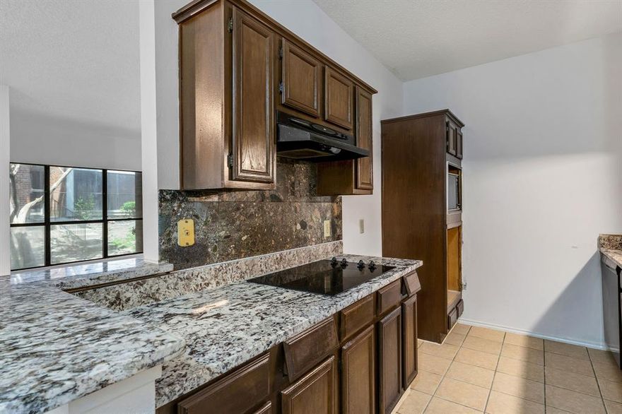 Nice remodel on the ground floor of great complex with pool.  Gated.  New counter tops,  Two bedrooms.  Covered parking #56, the number is 56 but is has been painted over so somewhat hard to decipher.  Stacked washer dryer connections.