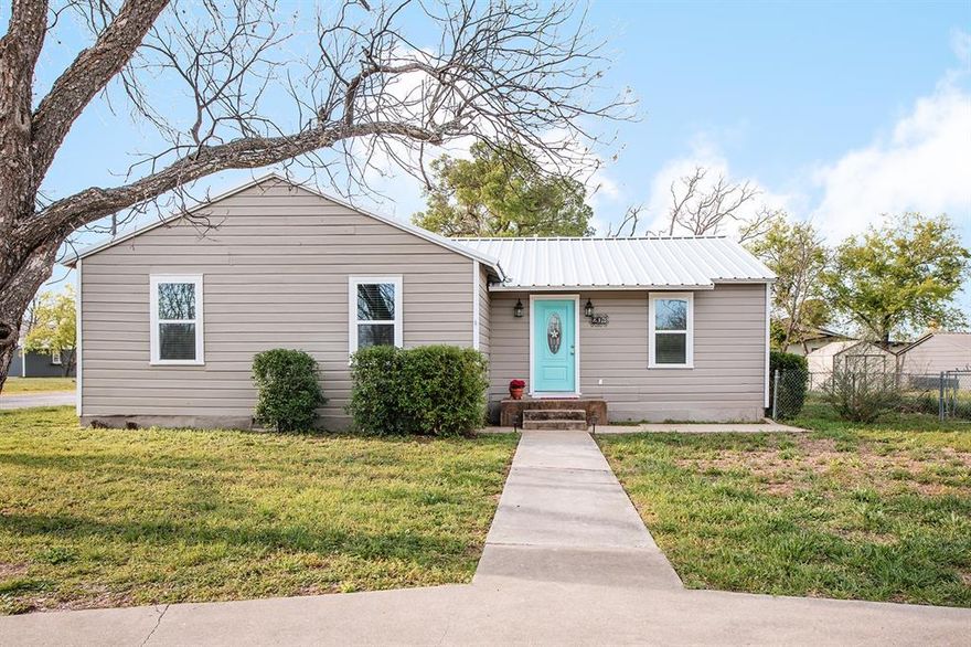 This cute home on Pearl Street is an updated 3 bedroom and 2 full bath home that seamlessly blends modern updates with timeless charm. The heart of the home is the stunning gourmet kitchen, complete with two sinks, sleek new stainless steel appliances, and a built-in beverage cooler, ready for all the for entertaining or casual family living. 
This home showcases both original and new real hardwood flooring and a pleasant light paint palette, creating a warm and inviting atmosphere throughout. Enjoy peace of mind with all-new electrical and plumbing systems, and take advantage of the detached garage for extra storage or parking. A new metal roof was installed in 2025, so the efficiency of this home is improved from top to bottom! Perfect for any season and appealing at multiple price points, don't miss this one!