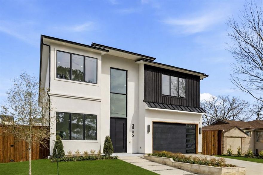 Crafted by Cozie Development Group, this modern transitional masterpiece defines luxury living in the heart of Midway Hollow. Spanning 5,000 sq ft, this 5 bedroom residence balances bold architecture with warm, organic design. A soaring two story foyer leads into a light-filled living area anchored by an Organic Modern fireplace and white oak flooring throughout. The designer kitchen impresses with Wolf & Sub-Zero appliances, white oak cabinetry, a stunning modern curved island, and a butler’s pantry with matching white oak finishes—designed for both beauty and function. Upstairs, discover a secondary living area, media room, and a second laundry room for ultimate convenience. The primary suite offers a spa inspired bath, custom closet, and a serene fireplace. Enjoy a covered balcony and pool-ready backyard ideal for entertaining. This Cozie Development home is a modern showpiece in one of Dallas' most desired neighborhoods.