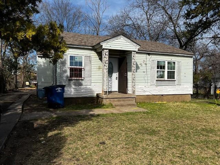 Attention investors, flippers, and visionaries — this is the deal you've been waiting for. A solid 2-bedroom starter home sitting on a generous lot in a location that checks every box: concrete street frontage, alley access, proximity to downtown, and public transportation at your doorstep. Whether you're a seasoned flipper ready to execute a high-ROI renovation or a buy-and-hold investor looking to plant roots in a rapidly appreciating neighborhood, this property is your canvas. The bones are there. The location is locked in. All that's missing is your vision and your crew. 
The spacious lot creates rare flexibility: expand the existing footprint, add an ADU (accessory dwelling unit) for additional rental income, or maximize land value with a complete rebuild. Alley access means construction logistics are clean and easy — a detail seasoned developers will immediately appreciate.