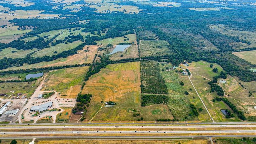 164 acres just outside of Sulphur Springs Texas in Hopkins County, with over 1200 ft of frontage on Interstate 30. The property is ideal for your dream home, commercial, or residential subdividing up front, and hunting - recreational in the back. Many options for commercial development in this quickly growing East Texas town along one of America's major Interstate Highways.