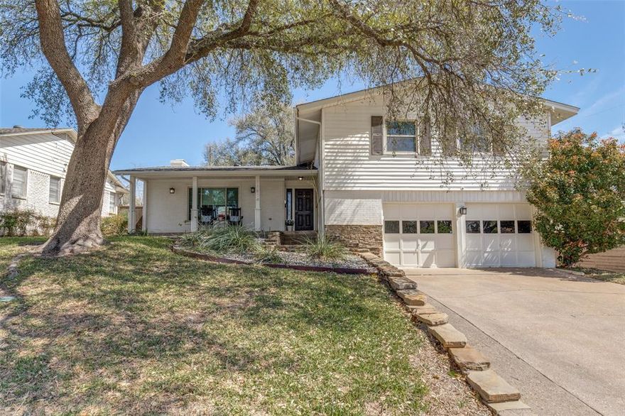 Welcome to this beautifully updated multi-level home in the highly sought-after Lochwood neighborhood of East Dallas. Known for its tree-lined streets, strong sense of community, and proximity to White Rock Lake and the Dallas Arboretum, Lochwood offers a lifestyle that blends nature, convenience, and charm. This spacious 1,952-square-foot home features a rare four-bedroom layout, all thoughtfully situated on the second level—ideal for both privacy and functionality. The main level offers an open-concept living and dining area filled with natural light, seamlessly connected to an updated kitchen complete with stainless steel appliances, soft-close cabinetry, and granite countertops. The lower level provides a versatile game, media, or family room—perfect for entertaining, relaxing, or creating a separate retreat. Situated on an elevated corner lot, the home is surrounded by mature trees and features a large backyard with plenty of room to host gatherings or enjoy quiet evenings outdoors.Ideally located just minutes from White Rock Lake, the Dallas Arboretum, and local dining and shopping, this home offers the perfect combination of space, style, and an unbeatable East Dallas location. New roof 2026.