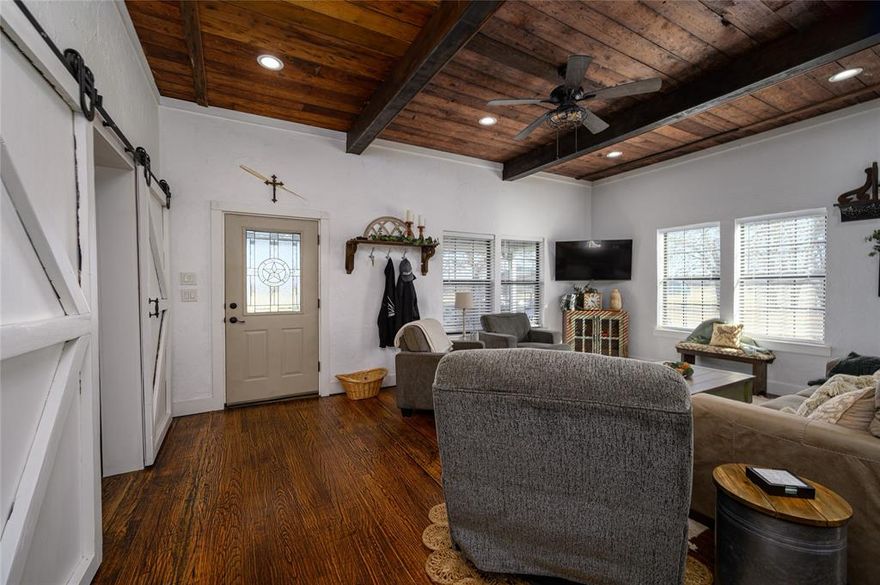 MOTIVATED SELLER! This charming farmhouse is set just off the peaceful and highly sought after Line Road. The home is full of character with soothing colors, warm wood in the countertops and floors, matched with a spacious floor plan and well thought out finishing touches will instantly make you feel at home. The front porch is perfect for quiet mornings with coffee while watching the sun rise.  On the back porch you are surrounded by trees for your own personal oasis from the rest of the world.  You will love being surrounded by nature, all within minutes of Whitesboro and Collinsville.