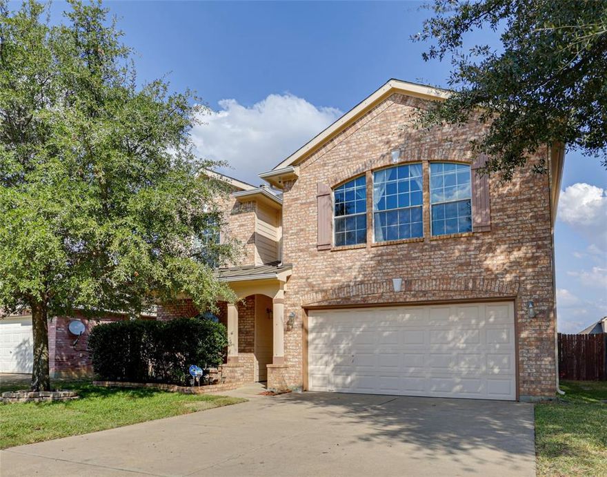 Welcome to this beautifully maintained Fort Worth gem, where modern updates meet comfortable living! Step into an open-concept floor plan designed for effortless flow and everyday functionality. The spacious living area features a striking floor-to-ceiling wood-burning fireplace and is flooded with natural light from large windows throughout the home. Smart home upgrades include smart light switches, a Nest thermostat, and exterior security cameras for added convenience and peace of mind. The chef-inspired kitchen is a true showstopper, boasting elegant granite countertops with a waterfall-edge island, stainless steel appliances, an induction cooktop, stylish pendant lighting, recessed fixtures, and abundant cabinet space. Step outside to relax or entertain under the oversized covered patio, overlooking a lush, fully fenced grassy backyard—perfect for pets, play, or gatherings. Ideally located just minutes from major highways, premier shopping, and top dining destinations, this home offers the perfect blend of comfort, style, and convenience. Refrigerator, washer, and dryer are negotiable.