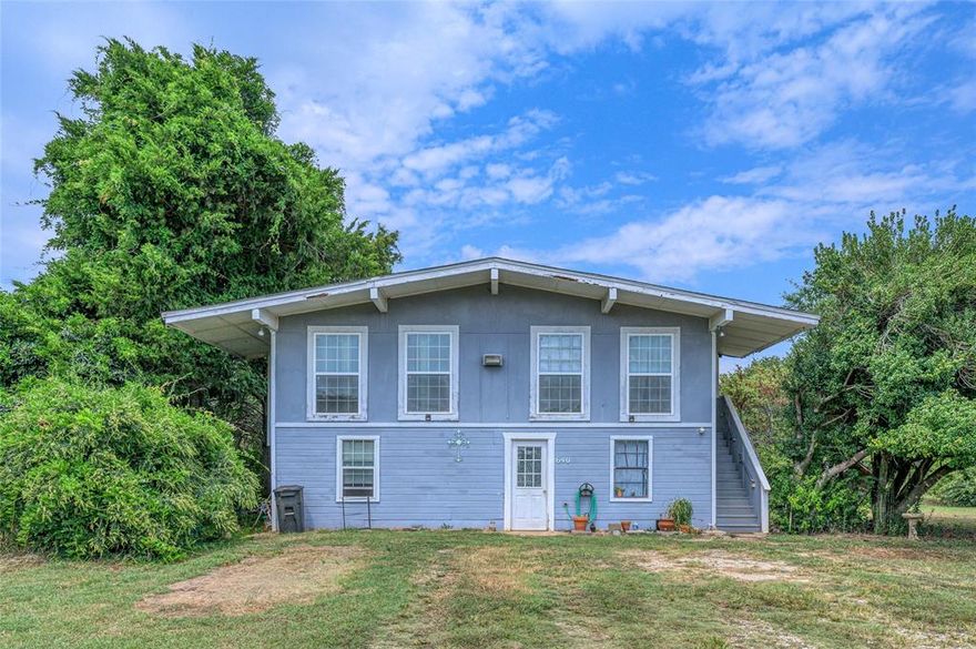 Investor special with strong upside in Gordonville.

Located in a quiet lake-side community near Lake Texoma, this property sits on a large double lot with mature trees and a secluded setting, offering both privacy and potential.

The home includes separate entrances for both upstairs and downstairs, creating excellent rental or multi-generational possibilities.

The downstairs is currently unfinished and designed for 2 bedrooms, 1 full bath, a living area, and storage. It will need flooring and full finish-out to complete.

The upstairs is fully functional, featuring an open kitchen, a spacious family room with tile flooring, 3 bedrooms, and 1.5 baths.

Additional improvements are needed, including a new roof and siding updates. Once renovations are complete, the property’s estimated after-repair value (ARV) is approximately $290,000, creating excellent upside for investors.

Just minutes from Lake Texoma and Sherman, this home offers seclusion, space, and long-term potential in a desirable and growing area.