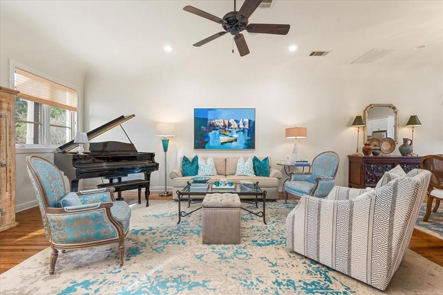 Behind the gates of the exclusive Casa Blanca residences, an exceptional three-story Spanish Revival townhome, crafted by the esteemed Village Homes, awaits. A private courtyard with an exterior fireplace invites you to enjoy this uniquely tranquil setting for evening gatherings or quiet mornings.

Inside, refined architecture, handsome wood flooring and tall ceilings create the perfect backdrop for entertaining or everyday comfort. The stately gas fireplace is the focal point of the living area. The light-filled kitchen is sure to be the heart of the home, blending timeless style and functionality. It features stainless appliances, granite countertops, a gas cooktop and its own coffee bar.

The entire third level is devoted to the primary suite, a true retreat featuring sliding doors that open to a romantic balcony. A spa-inspired bath and custom-designed walk-in closet complete this private sanctuary.

On the first-floor, you will find a secondary bedroom and bath, ideal for guests or a home-office. The laundry room is conveniently located on the first floor, also. A two-car attached garage features a thoughtful layout. This elegant lock-and-leave property offers architectural distinction in one of Fort Worth’s most coveted neighborhoods, Monticello, and promises to please the most discerning buyer!