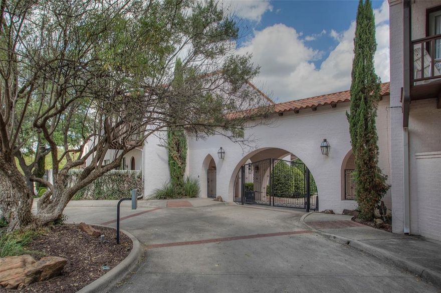 Behind the gates of the exclusive Casa Blanca residences, one of Fort Worth’s most sought-after gated communities, this exceptional three-story Spanish Revival townhome awaits. With 2,106 SF of curated living space, 2 bedrooms, and 2.1 baths, this move-in-ready residence is the perfect lock-and-leave home in Monticello.

A private courtyard with an exterior wood-burning fireplace invites you to enjoy a uniquely tranquil setting for evening gatherings or quiet mornings. Inside, refined architecture, handsome wood flooring, and tall ceilings create the perfect backdrop for entertaining or everyday comfort. The stately gas fireplace anchors the living area, while the light-filled kitchen serves as the heart of the home with stainless appliances, granite countertops, gas cooktop, coffee bar, and a large island ideal for gathering.

The primary suite occupies its own private level, offering rare separation and a true retreat with sliding doors to a romantic balcony. A spa-inspired ensuite bath and custom walk-in closet complete the sanctuary.

The secondary bedroom and full bath provide flexibility for guests or a home office. A two-car attached garage with extra storage completes the thoughtful layout. Located near the Cultural District, Camp Bowie, and downtown Fort Worth, this elegant townhome offers architectural distinction in one of the city’s most coveted neighborhoods