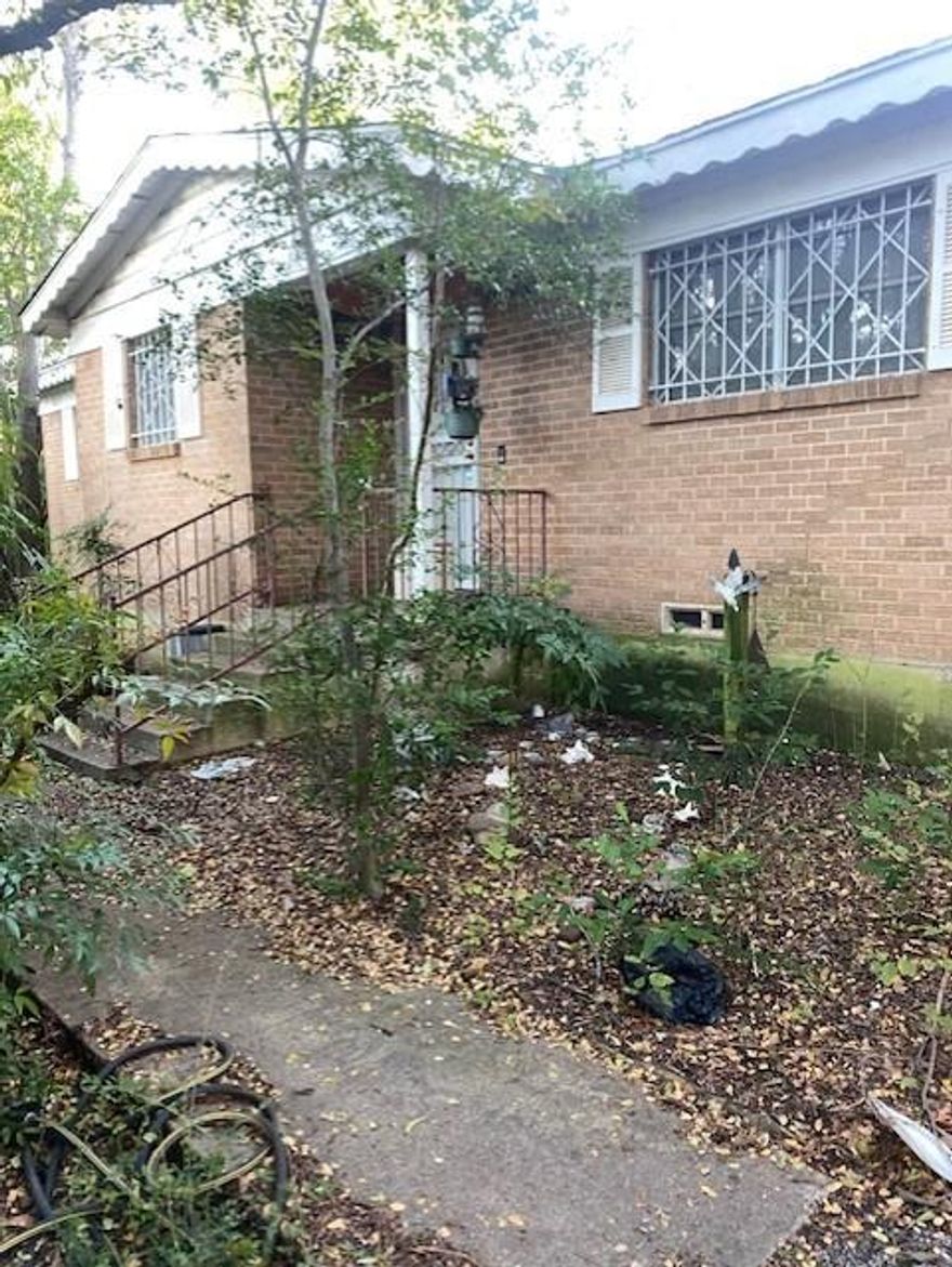 Great opportunity for the right person to own half an acre in city limits!  The home is a 3 bedroom, 1 bath home with detached carport and a detached she-shed.  Lots of great landscaping on the property that needs to be refreshed.  It was once a beautiful piece of property and with a lot of work, it can be again.  This is an estate and is an as-is sale.  Showings begin Wednesday, December 2nd