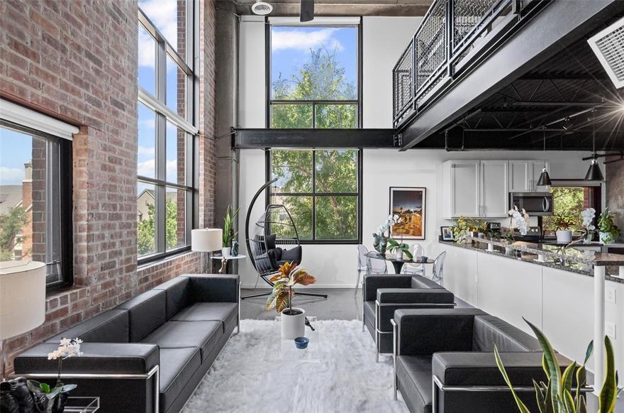 Spectacular corner unit with all the character that the special 588 Lofts building has to offer, including exposed red brick walls and floor to ceiling two story windows. This loft is truly one of a kind, with the first floor nestled amongst tree canopies and the upstairs with its panoramic downtown and uptown views. There is no other unit like it in the entire building! Meticulously cared for by the current homeowner, with home improvements that consist of fresh paint and high end kitchen appliances. An amazing opportunity to live in a building that has a 93 walk score and seven acre Griggs Park as your backyard! To keep the integrity of the building intact, there is a 30% rental cap for the building which has been reached. Should an owner wish to lease in the future they will need to get on the waiting list. The building is finishing up a fantastic face lift with an almost $2 million dollar renovation that has been paid and budgeted for. Come see what makes State Thomas living and this building so special!

For videos of the building and the loft, visit Facebook Page @ Block 588 Lofts, State Thomas.