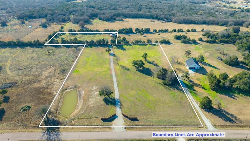For Sale! 7 Beautiful Acres Waiting for You to Call it Home!  Located in a Sought-After, Prestigious part of Cooke County. Less than 1 mile from Lake Kiowa. Lovely Sunsets and Clear Night Skies are in Abundance. This Land is Perfect for Building your Dream Home, or Running the Family Farm.  Spaciously platted front 5 acres has 375 feet of paved road frontage, large pond full of sunfish. There you can Build your Dream Home including Barndos, have your horses and cattle, whatever you can dream up with minimal building & deed restrictions. Separately platted, yet joined back 2 acres has NO, NONE, ZERO RESTRICTIONS!! There you may bring your MOBILE HOME, TINY HOUSE, build a BARNDO, CASTLE, TENT, RV..anything you want! or just have all the animals you want to keep there. The 2 UNRESTRICTED acres has Nice Fencing and Surrounded with Wonderful Cedar Trees that provide privacy and Keep Insects to a Minimum. 1006 sqft barn, loafing shed and multiple pens are built upon the 2 acres.  2 STOCKED PONDS, at the front and back of the property. Woodbine WATER METER included with sale. Pentex electricity at the street. Solar Lighting installed in and on the barn. Bring your Horses, Donkeys, Chickens, Goats, Sheep, Cows, Pigs and Grow an HUGE Vegetable Garden!  Posibilities are Endless.  Buy Now!
