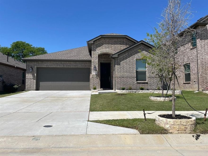 Charming family home built in 2022 near the Water Park in highly sought community Stark Farms! This home featured one-story 3 Bedrooms with a study room. Perfect upgraded designer kitchen that equipped with gas stainless steel appliances, expresso-color cabinets, Granite counter tops and overlooks into the dining and great room with high ceilings. Spacious Primary bedroom provides an oversized standing shower, bonus linen closet, and a walk-in closet. Expect the bedrooms this home also includes upgraded wood-like tile flooring throughout the entry, bathrooms, living area, dining area and kitchen! Beautiful design touches throughout and also offer a covered back patio for entertainment. Obtain a feel for country living but enjoy being within minutes of all major shopping centers. Also 10 mins driving from University of North Texas and Texas Women University.