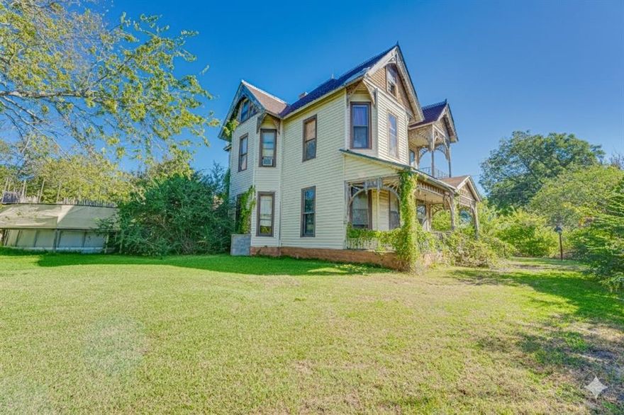 Step back in time with this 1898 Victorian home offering 4,112 square feet across four floors. Featuring 4 bedrooms and 3 full baths on an oversized lot, the home showcases original woodwork and hardwood floors throughout. While it will require significant restoration, it holds wonderful potential for someone with a vision to bring its historic charm back to life. A rare opportunity to own a true piece of history and make it your own.