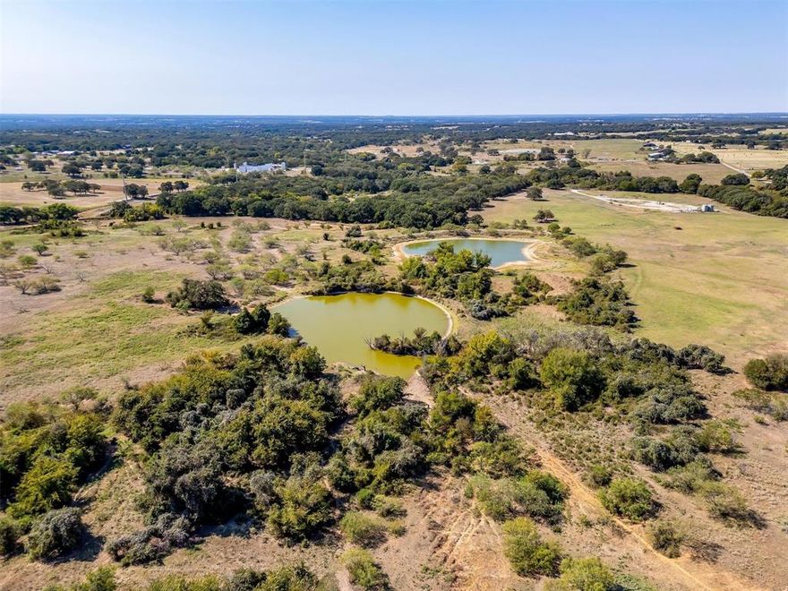 Take a look at this tremendous opportunity! 140 acres with an AG exemption just outside the city limits and in the ETJ of Decatur. Tracts of this size, proximity, and makeup are very rare in this market area. The property has effortless access to FM 51 and over 1900' of road frontage on Murvil Street and NO RESTRICTIONS. Decatur Middle and High Schools are less than 1.5 miles from the property. There are several nice water features, the largest pond being 1.5 acres and no floodplain. Ground water is readily available in this area and water wells generally range from 200-400' deep. There is a well-maintained one-story 2700 sqft residence and a small RV park in addition to a cattle operation. Buyer and buyer's agent to verify all information contained herein.