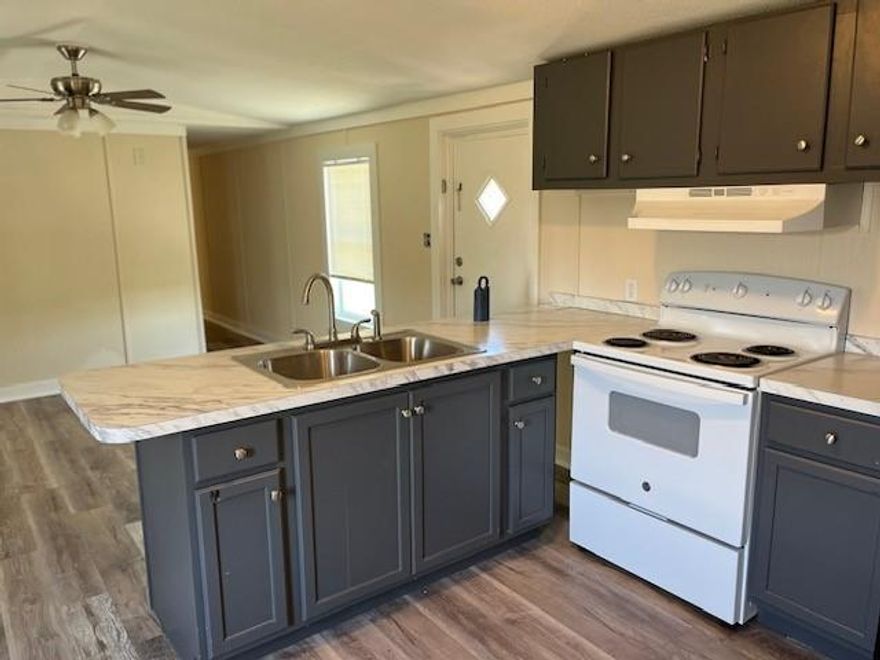 Bonus! Sign a 12 month lease and get the 7th month rent FREE! Newly painted inside & out! New laminate flooring throughout. Kitchen has updated counters & cabinets. Three bedrooms. The mobile home is located in a small, quiet, well maintained mobile home park. Rent includes trash pickup, water and lawn maintenance. Just outside of Krum, kids go to Krum ISD. About 5 miles to I35, so it's easy to get to shopping and dining.  * Tenant + Tenant's agent is responsible for verifying all information, measurements, schools, fees and regulations.