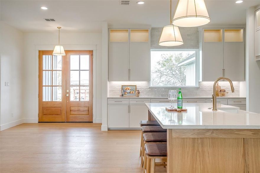 This exceptional 5-bedroom new construction home showcases elevated design and premium upgrades throughout. Ideally situated just 30 minutes from downtown Fort Worth and 10 minutes from Benbrook, the property offers easy highway access while still providing the peace and privacy of a more secluded setting. Backing to a large ranch with no rear neighbors, this homesite delivers an added layer of privacy and wide-open views.

Inside, a bright and open floor plan is anchored by engineered white oak flooring that flows seamlessly through the home, adding warmth and sophistication to each space. The spacious living room serves as a stunning focal point, featuring a wood-burning fireplace with a gorgeous cast stone surround, blending timeless elegance with inviting comfort and creating the perfect gathering space.

The gourmet kitchen is designed to impress with premium quartz countertops, an oversized island, custom cabinetry, designer lighting, and high-end appliances. 

The private primary suite offers a true retreat. The spa-inspired primary bathroom features a large freestanding soaking tub, an expansive walk-in shower, generous storage, and beautifully appointed quartz countertops creating a space that feels both luxurious and highly functional. Four additional bedrooms provide flexibility for family, guests, or a home office.

The powder bath makes a striking statement with Taj Mahal quartzite countertops and a custom-designed vanity, offering a sophisticated and memorable space for guests.All bathrooms are beautifully appointed with designer tile selections, including statement showers and elevated finishes that reflect exceptional craftsmanship. 

Every closet has been outfitted with custom built-in cabinetry and organizational systems, blending functionality with high-end design. This home was  thoughtfully curated with premium materials and exceptional attention to detail throughout.