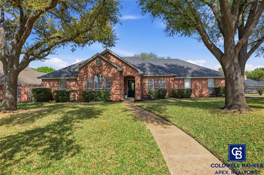 Discover this beautifully updated home with 3 bedrooms plus a bonus room nestled in a serene neighborhood on a spacious, tree-shaded lot offering peace and privacy just minutes from everyday conveniences. The freshly painted interior bursts with natural light from generous windows, creating a bright and welcoming atmosphere throughout. The expansive living room features a cozy fireplace, ideal for gatherings or quiet evenings. A flexible bonus room provides versatile options perfect as a home office, formal dining space, or hobby room. The gourmet kitchen shines with sleek granite countertops, abundant cabinet storage, an eat-at bar, and an open dining area that overlooks the wonderful backyard making it a dream for cooking and entertaining. Generously sized bedrooms feature great closet space. The large primary suite is a luxurious retreat, complete with an ensuite bathroom offering dual vanities, a relaxing garden tub, and a separate newly remodeled walk-in shower. Additional highlights include a large utility room and mudroom featuring custom storage. Step outside to your private oasis: a large, covered patio perfect for year-round enjoyment, overlooking the peaceful backyard. There’s even a 12x12 shed with electricity.  Move-in ready with modern updates including water heater, HVAC and duct work replaced in 2020, new doors and hardware, outside trim replaced and painted, and backyard shed recently painted.  All this in a tranquil setting waiting for a new family to continue loving it.