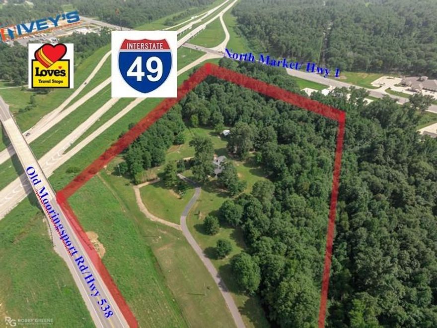 LOCATION LOCATION LOCATION 3 Major Roads for this property. 772' of frontage on Old Mooringsport, 557' on I-49 & can be easily be seen but not accessed from the Hwy 1 or North Market side. There is another 2 acre parcel also available for signage or to add to but McCain Creek separates them.  Together these properties are the corner lots between Old Mooringsport & N Market, running along the WEST side of I-49. Perfect for the newly developing North S'port area & corridor to downtown & through Shreveport. Hotel, Restaurants, Strip Malls, anything & EVERYTHING can go here. Walmart is across the street.
