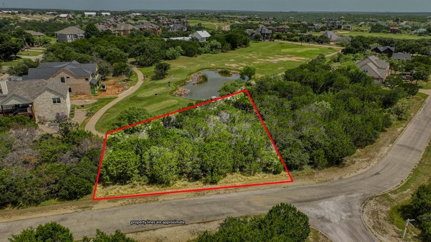 Golf Course Lot in The Cliffs Resort at Possum Kingdom Lake!
Fantastic location right on Hole #12 and just one block from the stunning Oyster Bay cliff line—potential for lake views from a two-story home. Enjoy all the perks of resort living with 36 free rounds of golf per year, two pools, marina access, tennis & pickleball courts, clubhouse dining, and more. Close to the VIP marina, main pool, and restaurant. No build timeline, minimal restrictions, and you can bring your own builder. Secure your spot at PK and start planning your dream home or weekend escape!