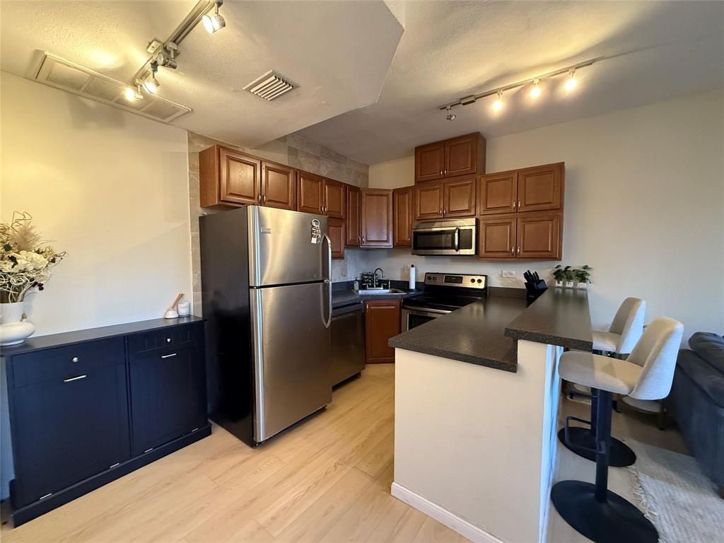 Photo of 5757 E University Boulevard #22R, Dallas, TX 75206 (MLS # 21138868)