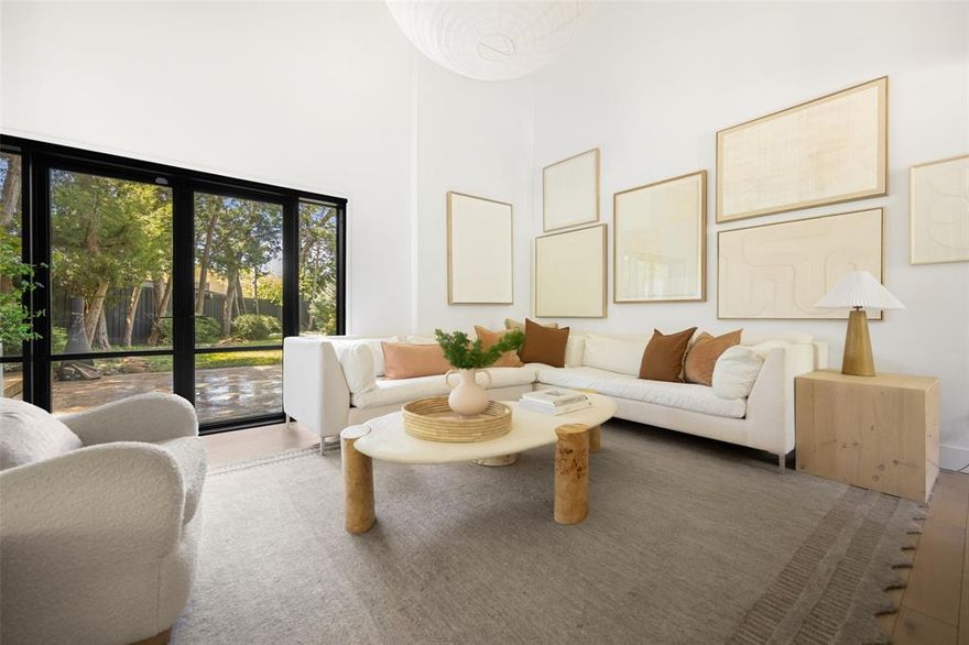 Welcome home to your mid mod masterpiece in the heart of Dallas! This stunning abode boasts 4 spacious bedrooms and 2 modern bathrooms. Nestled on a expansive lot, this property offers ample space for both indoor and outdoor living. Step inside to find a tastefully updated interior where style meets function. The open-concept living area features vaulted ceilings and floor-to-ceiling double doors that flood the space with natural light and provide breathtaking views of your private backyard retreat. The chef's kitchen, adorned with sleek custom cabinetry and granite countertops, is a culinary enthusiast's delight. The original stained glass windows give a nod to the home's history and charm. The outdoor space is a true haven, with a large deck perfect for entertaining and stone pathways that meander through mature trees. Whether you're relaxing or hosting, this home is designed for modern living with a casual twist. Just minutes from White Rock Lake, this home offers ample opportunities for outdoor activities. And in close proximity to the best shopping and dining that Dallas has to offer, this gem is truly in the center of it all. Make it yours today!