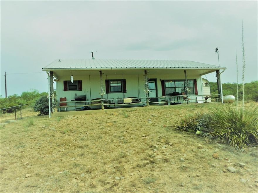 Hunting retreat ready for your family or company.  There are over 712 acres of land loaded with hunting of almost any kind, Deer, Turkey, Hog, Coyote,Dove and Quail.  There are two cabins, one with three bedrooms and two restrooms and one with two bedrooms and one bath along with a RV parked under a metal roof.  There is lots of elevation change on the place that is covered mostly with mesquite and cedars.  There are six ponds on the place and one field that is used for a food plot in the winter.  There are also a nice set of cattle pens and barns.  One of the nice features of this place is its close proximity to Lake OH Ivie one of the premier Bass fishing lakes in Texas.