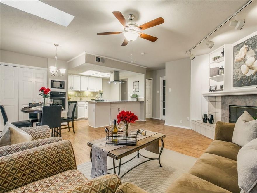 This Beautiful and very well maintained home is move in ready.  One story 3 bedrooms, 2 full baths and is centrally located close to shopping and entertainment. The modern look of granite counter tops and warm wood floors in main living area are accented by the wood burning fireplace. The open concept makes it easy for entertaining family, guest and more. The kitchen is equipped with a glass stove top, in wall oven and microwave. Very nice large backyard with a covered large covered deck and 8 foot wood privacy fence. The attic is floored for extra storage as well as cabinets in the garage.  Low E windows and Plantation shutters make living in comfort more affordable.