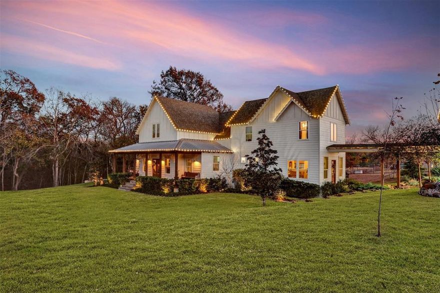 Welcome to this beautifully crafted 2-story white farmhouse set on one acre of Southern countryside, perfectly positioned along a quiet creekside backdrop. With 5 bedrooms and 3.5 baths, this home blends modern farmhouse comfort with relaxed rural living all outside city limits with zero restrictions.

The property offers thoughtfully planned landscaping with open skies, fresh plantings, and space to create the outdoor setting you’ve always imagined. The yard rolls gently toward the creek, giving the home a peaceful, private feel and a true Southern touch.

Step inside and you’re greeted with warm charm and bright natural light. The main floor features an inviting open living and kitchen with farmhouse accents, and a spacious primary suite set off the main house by a vestibule. Upstairs offers additional bedrooms and flexible space perfect for kids, guests, or a home office.

Outside, enjoy the sound of the creek, stunning mature Red Oak trees and endless possibilities on unrestricted land. Add a shop, garden, chickens, a pool—or simply enjoy the quiet country breeze.

This Southern farmhouse is the perfect blend of charm, space, and freedom—move-in ready and waiting for its next story.