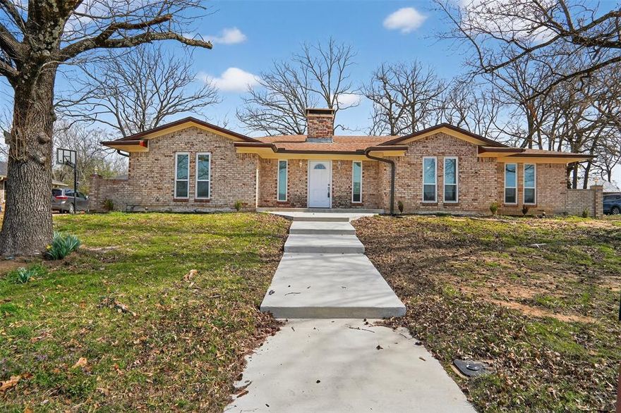 COMPLETE MAKEOVER. Morningside 4 bedroom 3 bath 2 car garage brick features cathedral ceiling living room with fireplace, enclosed den and sunroom, split bedrooms and 2 eating areas. New are redesigned kitchen with granite tops, cabinets, stone, tower hood. Remodeled utility, light fixtures, fans, paint -- virtually everything is upgraded or new. Extensive non-skid ceramic flooring except bedrooms, quartz top bath cabinets and much more. Outside are new sidewalks and patio, oversized garage, seamless gutters and french drains. Find the upgrade list in associated documents.  This is a MUST SEE!