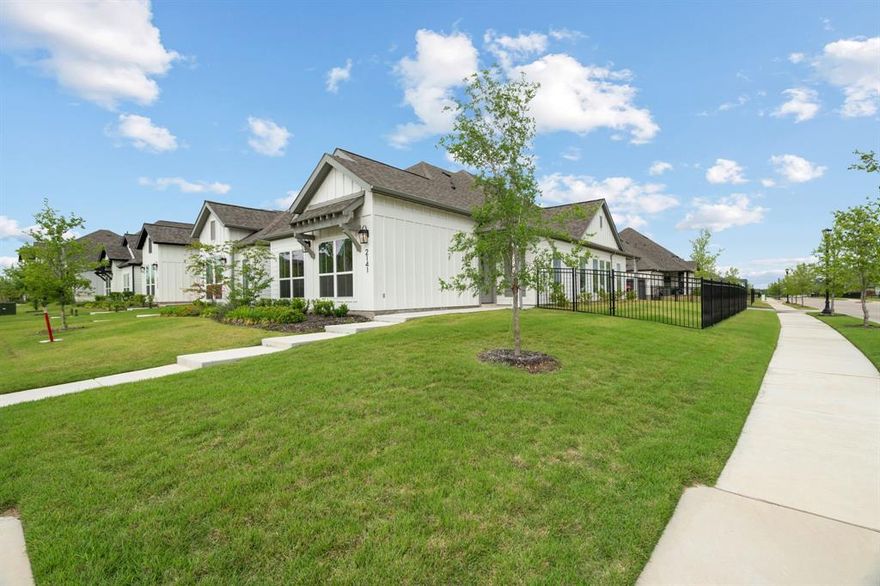 Located in the highly sought-after Walsh Ranch community within Aledo ISD, this stunning single-story home sits on a desirable corner lot and offers the perfect blend of style and functionality. The inviting entry opens to a spacious, open-concept layout featuring the kitchen, family room, and dining area—ideal for both everyday living and entertaining. Beautiful hardwood floors flow throughout the main living areas, while abundant natural light and soaring 10-foot ceilings create a bright and airy atmosphere. The well-appointed kitchen boasts a large island with built-in seating, a walk-in pantry, and a 5-burner gas cooktop—perfect for any home chef. The private primary suite offers a relaxing retreat with a generously sized bedroom and 10-foot ceilings. Double doors lead to a luxurious en-suite bath featuring dual vanities, a separate glass-enclosed shower, and two spacious walk-in closets. Two additional bedrooms and a full bath provide flexibility for family, guests, or a home office. Step outside to enjoy the covered backyard patio—perfect for outdoor relaxation. A two-car garage completes this exceptional home. Don’t miss your opportunity to own this beautiful property in one of the area’s most desirable communities!