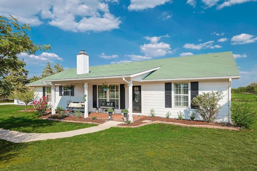 A RARE FIND! Come enjoy country living just minutes from charming downtown Bowie! This classic farmhouse is nestled on a spacious 1-acre lot offering all the comforts of modern living in a peaceful countryside setting! As you step inside, you'll immediately notice the recent updates that have been lovingly added to this home: The kitchen and baths have been beautifully remodeled, boasting elegant granite countertops that blend seamlessly with the farmhouse aesthetic! Durable hardwood tile flooring graces all common areas, providing both elegance and practicality! Step outside, to find a Texas-sized screened-in back porch! It's the ideal spot to unwind, sip your morning coffee, or enjoy a peaceful evening while taking in the picturesque country view! The split-bedroom floor plan ensures the primary suite is a serene retreat, complete with a well-appointed bathroom and a walk-in closet! Escape the hustle and bustle of city life and immerse yourself in the tranquility of country living!