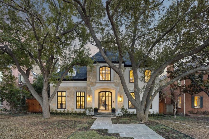 Welcome to this beautifully updated home, nestled on a spacious 70 x 160 lot in the prestigious Fairway of University Park. From the moment you step inside, you'll be captivated by the elegance and sophistication, beginning with a stunning floating staircase that makes a bold statement. This 5-bedroom, 7-bathroom residence is thoughtfully designed with luxurious finishes throughout. The formal living room features a striking barrel-vaulted ceiling and a cast-stone fireplace, while the modern dining area showcases exquisite designer wallpaper.  Perfect for entertaining, the home includes an impressive powder bath and a stylish office with temperature-controlled wine storage. The expansive open-concept family living and dining area, highlighted by a double-sided fireplace and wet bar, creates the ideal setting for both gatherings and quiet relaxation. The chef-inspired kitchen boasts porcelain countertops, a Bertazzoni range, and a Butler’s Pantry, making it perfect for culinary creations.  Upstairs, all five en suite bedrooms, along with a game-media room, provide ample space and comfort. The Primary Bedroom is spacious with a sitting area and fireplace, balcony overlooking the pool and backyard, and a gorgeous bathroom with two walk-in closets.  French doors lead to the backyard, where you’ll find a sparkling pool, spa, and turfed yard. A convenient pool bath is accessible from both the back patio and the interior hallway, located between the kitchen and the oversized attached garage.  Located in a vibrant, walkable community, this home is just minutes from shops and restaurants in Snider Plaza and Preston Center, as well as Turtle Creek Park, Tennis Courts, and the UP Pool. A true gem in University Park!