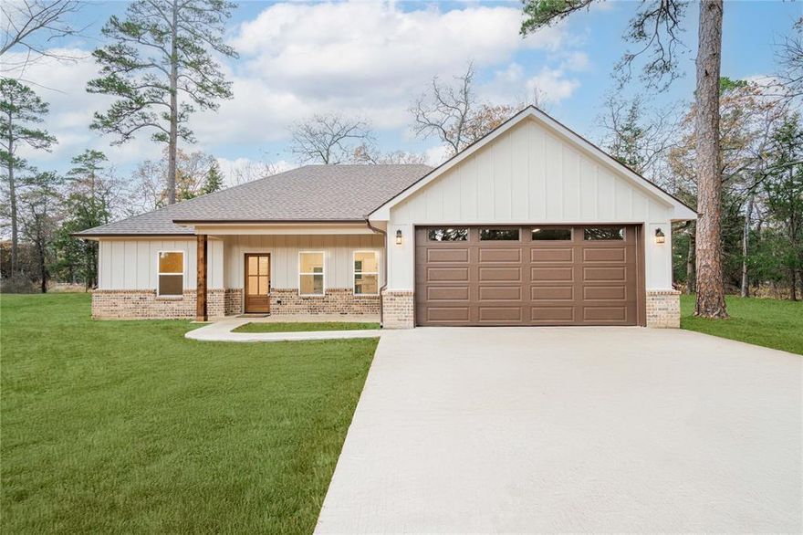 Beautiful New Cottage-Style Home Near Lake Cypress Springs! Nestled in the highly desirable King’s Country gated community, this brand-new 3-bedroom, 2-bath home offers peaceful lake-area living on a 0.42-acre wooded double lot. Built with durable, low-maintenance Smart Siding, the home features 1,620 square feet of quality craftsmanship and a thoughtfully designed open-concept floor plan perfect for both everyday living and entertaining. Inside, the spacious living area flows effortlessly into a bright kitchen and dining space, where large windows flood the home with natural light and showcase serene wooded views. Enjoy the simple pleasure of watching deer wander by from your kitchen window or relaxing on the back porch surrounded by nature. The layout includes a convenient Jack & Jill bathroom connecting the two secondary bedrooms—ideal for guests or family—while the private primary suite offers its own en-suite bath and generous walk-in closet. A 2-car garage provides ample parking and storage. Located just a short distance from Lake Cypress Springs, one of Texas’ most crystal-clear, spring-fed lakes, you’ll enjoy easy access to boating, fishing, paddleboarding, and scenic waterfront recreation. Evenings bring peaceful nights under the stars, while days are filled with everything lake life has to offer. King’s Country HOA amenities include tennis courts, clubhouse, boat ramp, and boat slip rentals—making this the perfect full-time residence or weekend retreat.