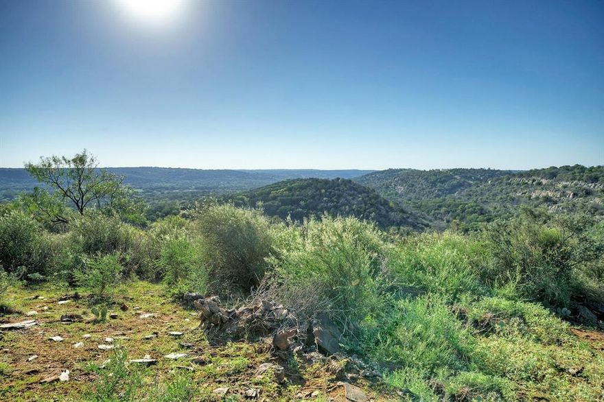 Phenomenal Hill Country ranch just outside of Llano & just over 1 hr. to Austin. 312 plus or minus acres, this ranch is entirely HIGH fenced. Ranch features several species of exotic game. There is also a very healthy Whitetail deer population. Hogs & wild turkey are also available to hunt. Very diverse ranch with rugged mountains, hilltops, bottomland, pasture, & abundant tree coverage, including large live-oak, Spanish oak, cedar elm, pecan, mesquite, prickly pear & others. The views, vistas are nothing short of spectacular. There are many very nice water features throughout the ranch including one lake, & several wet weather creeks & small ponds. There is an exceptional road system throughout the ranch, making most of it accessible. Additionally, a 3-3 brick home, a 3-1 bunkhouse, & 2 barns. There is a large pump house storage box & 1 electric well plus 1 windmill. Ranch is easily accessed, 20 min. from Llano via Hwy 16 on scenic CR 435 & is less than 90 min. back to Central Austin.