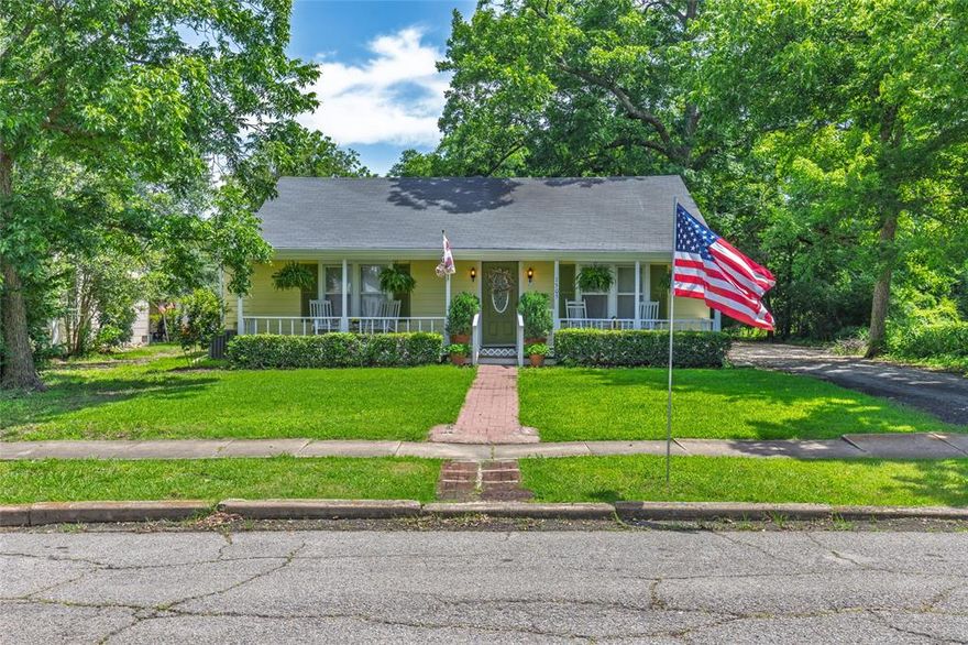 Price Improvement!! Step into the charm of small-town living at 1505 Bonham Street in Commerce, Texas — a beautifully preserved home situated on one of the city’s most historic and picturesque streets. Built in 1945 and thoughtfully maintained, this inviting 3-bedroom, 2-bathroom residence offers a unique blend of character, comfort, and functionality on a spacious 0.29-acre lot. Inside, you'll find two spacious living areas perfect for entertaining or relaxing, highlighted by an elegant electric fireplace that adds warmth and ambiance without the hassle. The kitchen features ample cabinetry and flows seamlessly into the dining and living spaces, creating an ideal setup for hosting family and friends. Each bedroom offers generous space, natural light, and vintage charm, while the bathrooms maintain the classic feel of the home with updated conveniences. Enjoy your morning coffee or unwind in the evening on the charming covered front porch, or head out back to the expansive patio—ideal for family gatherings, weekend barbecues, or simply listening to the birds while the sun rises or sets. The large backyard offers plenty of space for gardening, play, or pets, with mature trees providing shade and privacy. A 2-car garage and additional 2-car carport provide abundant parking and storage, perfect for guests, hobbies, or extra vehicles. Whether you’re a first-time homebuyer, a growing family, or looking for a peaceful retreat with easy access to town, this home fits the bill. Conveniently located just minutes from East Texas A&M, downtown, local shops, dining, schools, and entertainment, 1505 Bonham Street offers not only a welcoming home but a lifestyle full of convenience, community, and charm.
