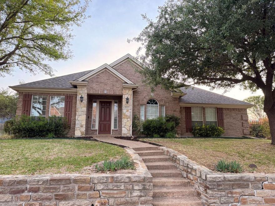 Welcome to 2185 Clubview Dr in the highly popular Shores community of Rockwall! This open floor plan 1.5-story home offers approximately 3,083 sq ft with a versatile floor plan featuring 3–4 bedrooms, 2.5 baths, a dedicated study, formal dining, and an upstairs bonus room or optional 4th bedroom.

The open-concept layout is perfect for both everyday living and entertaining, highlighted by rich wood flooring and a stunning stone fireplace with gas logs in the spacious living area. The kitchen offers abundant cabinetry, generous counter space, and a large center island, seamlessly flowing into the main living and dining areas.

The private primary suite is located on the main level and features a spacious layout with a large en-suite bath. Two additional bedrooms are also downstairs, while the upstairs flex space includes a large walk-in closet—ideal for a game room, guest suite, or media room.

Situated on a desirable corner lot, the home also features an oversized garage and great curb appeal. Enjoy all the amenities The Shores has to offer, including a community pool, clubhouse, golf course, and scenic surroundings. Conveniently located near shopping, dining, and Rockwall ISD schools.

Don’t miss this opportunity to own a spacious and well-appointed home in one of Rockwall’s premier neighborhoods!