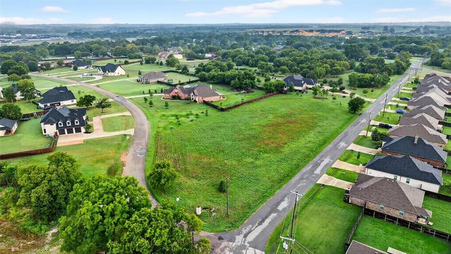 Located in one of Sherman’s most established and desirable neighborhoods, this spacious 1.55-acre corner lot offers an exceptional opportunity to build a custom single-family home with room to breathe. The property provides a peaceful residential setting while remaining just minutes from shopping, medical offices, and everyday conveniences. Families will love the proximity to a scenic waterfront park featuring two playgrounds, an open-air amphitheater, and fishing areas—perfect for weekend outings and outdoor fun. Situated just minutes from the Heritage Ranch master-planned community, which will include a new elementary school, retail and entertainment options, and a $400 million acute care hospital set to break ground in 2026. With generous space for a backyard oasis, guest house, or even a workshop, this property offers the flexibility to create a home that fits your lifestyle today and grows with your family tomorrow. It’s a rare chance to enjoy the charm of an established neighborhood while investing in Sherman’s exciting future growth.