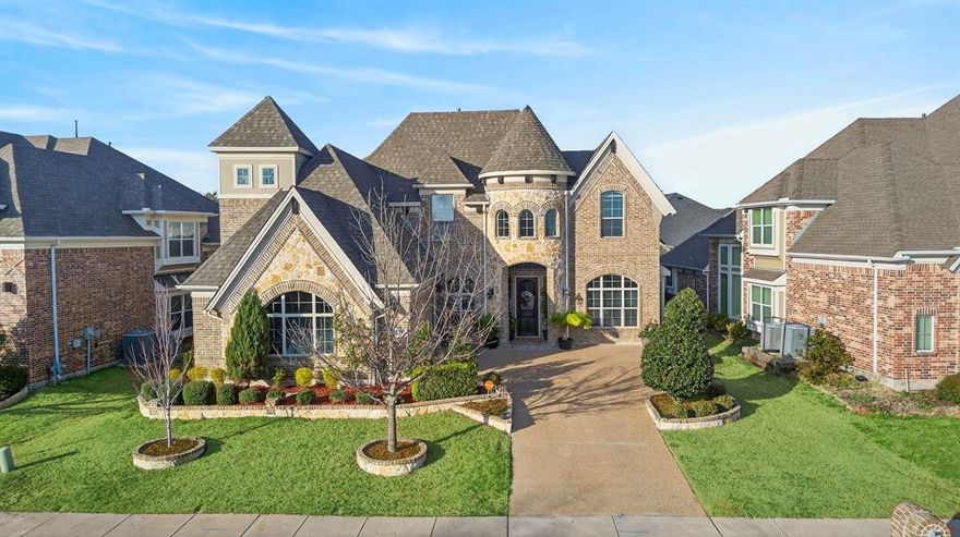 Welcome to this stunning 6-bedroom, 4.5-bath luxury home located in one of Wylie’s most desirable neighborhoods. This spacious home features soaring ceilings, rich hardwood floors, and a dramatic entry with a beautiful curved staircase.

The open-concept living area is filled with natural light from large windows and features a cozy fireplace, creating the perfect space for relaxing or entertaining. The gourmet kitchen offers custom cabinetry, stainless steel appliances, granite countertops, stylish tile backsplash, and a large center island with seating. The kitchen opens to both the breakfast area and the main living room for seamless everyday living.

The primary suite provides a spacious retreat with room for a sitting area, while additional bedrooms offer flexibility for family, guests, or home office space.

Upstairs features an oversized game room and a dedicated media room, ideal for movie nights, gaming, and entertaining.

Step outside to a beautiful backyard designed for entertaining, complete with a covered patio, stone flooring, pergola-style ceiling with string lighting, and a fully equipped outdoor kitchen and grill station—perfect for enjoying Texas evenings year-round.

Additional highlights include a formal dining room, private office, multiple living areas, and a storm shelter located in the garage for added safety and peace of mind.