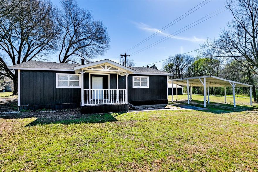 UPDATED HOME ON 5 LOTS NEAR LAKE TAWAKONI — USDA 100% FINANCING ELIGIBLE! A beautifully remodeled 3-bedroom, 2-bath home situated on five combined lots totaling approximately 0.655 acres in the Sun Point subdivision. Just minutes from Lake Tawakoni, this property offers flexibility, privacy, and room to grow. Inside, you’ll love the light-filled open floor plan featuring easy-care ceramic tile and laminate flooring, fresh paint, decorative lighting, and a cozy wood-burning stove. The kitchen is thoughtfully updated with a farmhouse sink, breakfast bar, island, tile countertops, built-in cabinetry, walk-in pantry, and appliances including refrigerator. The spacious primary suite includes a custom closet system and ensuite bath with dual sinks, granite countertops, built-in cabinetry, and a relaxing garden tub. Two additional bedrooms offer generous space and storage. Washer and dryer are conveniently located in the primary bath. Step outside to enjoy the covered front porch and covered, screened-in back porch — perfect for relaxing evenings. The property also features a 16' x 22' storage shed, double covered carport, cleared acreage with scattered trees, and ample space for a shop, RV, boat, or future build. With septic system, NO HOA, and NO CITY TAXES, this property is ideal as a primary residence, weekend getaway, or investment opportunity. Located in Rains ISD and eligible for 100% USDA financing — ask for details!