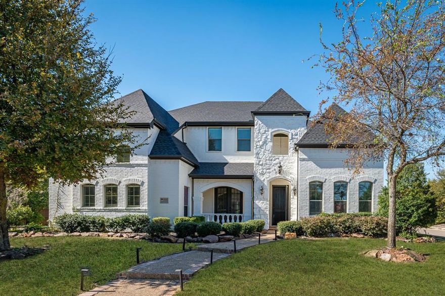 Experience refined living in this stunning Rolling Ridge Estates 6 bedroom home. The elegant interior greets you with a dramatic foyer, soaring ceilings, hardwood flooring, and a radiant chandelier that sets the stage for the luxury within. The kitchen is both stylish and functional, featuring granite counters, custom cabinetry, a butlers pantry, & center island perfect for gourmet meals or casual entertaining. Just off the kitchen, bask in the light-filled breakfast area or gather in the formal dining room, ideal for hosting unforgettable dinners. The spacious primary suite serves as a tranquil escape, offering a cozy sitting area, a spa-like bath, and a generous walk-in closet. Thoughtfully designed floorplan has one secondary bedroom downstairs, and 4 more upstairs - one makes a fantastic game room. Outdoors, enjoy multiple spacious patios tailored for open-air dining or unwinding beneath the vibrant Texas sunsets. 3 car garage with epoxy flooring. NEW ROOF and GUTTERS INSTALLED JULY 2025! This remarkable property seamlessly combines classic charm with contemporary luxury, making it a true gem. Plano ISD. Close to restaurants & shopping!