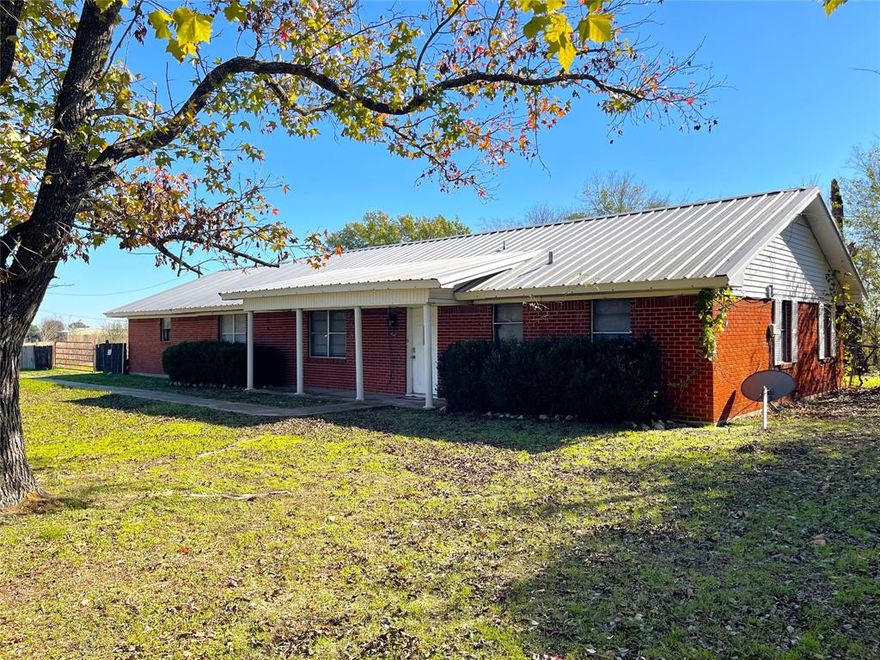 A well maintained brick 3 bed 2 bath home built in 1976 per LCAD.  The home sits at the edge of Groesbeck city limits so you have all the benefits of city services while it’s outside of town just enough to have a peaceful country living feel.  The property is approx. .772 acres per LCAD with fenced large front & back yards and a fenced side yard. There are shade trees, one of which is a giant pecan tree. Groesbeck city services. Metal roof, attached garage has been converted into a playroom.