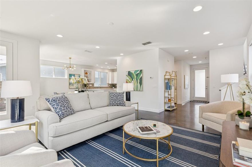Move-in ready and beautifully presented, this modern East Dallas home in The Grove at Lovers Lane was repainted top to bottom and professionally staged in January 2026, offering buyers a fresh, polished look and an easy way to envision themselves at home. Featuring 3 bedrooms, 2.5 baths, a loft-office, and a two-car garage, this residence is located in a highly desirable, energy-efficient community near White Rock Lake.

The open-concept layout showcases polished concrete floors, abundant natural light, quartz countertops, stainless steel appliances, a gas range, and generous pantry space—ideal for both everyday living and entertaining. Thoughtful storage is found throughout, including a large under-stair closet, a secondary storage closet in the primary suite, and a bonus space off the front bedroom perfect for a play area, hobby room, or overflow storage.

Upstairs, hardwood floors lead to the private primary suite with spa-style bath and walk-in closet, two secondary bedrooms, and a flexible loft space ideal for a home office, media room, or workout area.

Designed for comfort and efficiency, the home includes spray foam insulation, Low-E windows, a tankless water heater, and solar panels with a prepaid lease through 2036, helping keep utility costs low. The HOA maintains front and backyard landscaping, providing a true low-maintenance, lock-and-leave lifestyle.
Located minutes from White Rock Lake, the SoPac and Katy Trails, Central Market, Greenville Avenue, Lakewood, and Central Expressway, this home delivers modern design, sustainable living, and unbeatable East Dallas convenience.