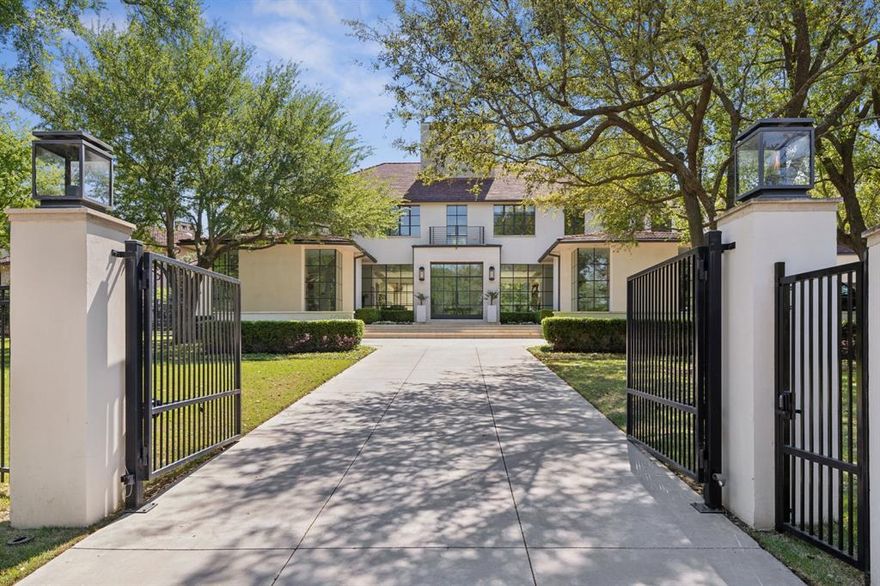 Located on a gated 1.1-acre lot on one of the most prestigious streets in Old Preston Hollow, this exceptional estate by CID award-winning builder S&R Development defines luxury living. Tucked away in a serene, storybook setting, the home captures stunning outdoor views from every angle, offering both privacy and connection to nature. Blending a modernist aesthetic with the charm of southern France, the residence features expansive open living spaces framed by floor-to-ceiling steel windows that overlook a resort-style pool, terrace, and beautifully manicured gardens. Every detail reflects thoughtful design—seamlessly integrating sophisticated architecture with lush landscaping, tiered green spaces, and effortless indoor-outdoor flow. A separate casita, currently utilized as a gym, offers flexibility to serve as a pool or guest house. The property is equipped with a full-house generator. The four-car garage features four lifts, maximizing vehicle storage—a rare combination of premier location, inspired design, and tranquil elegance.