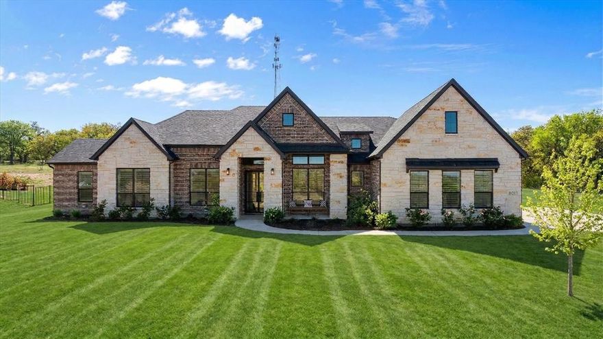 Check out this stunning 4 bedroom  2.5 bath, office area, open concept home with a 3 car garage in Luker Ranch just South of Granbury.   This home was built in 2023 by Stella Rose Homes.  Take a second and come see for yourself this home is magazine beautiful...with many added amentites.  The home has an ensuite primary quarters away from the other 3 bedrooms for privacy,  the ensuite bedroom, bath is a homeowners dream with walkin shower and tub area a double vanity and walk in closet that carries through to the utility room for ease and comfort.   The home has office off the front entry, walking into a large open living room that has kitchen and island area for entertaining, or carry your party out the back through the large sliding glass doors to the 16 x16 covered patio for evening events.   Home has added custom plantation shutters, epoxy flooring and 2 overhead storage areas in the oversized garage,  custom floor to ceiling linen cabinetry in the laundry room for organization and storage.  Designer gallery lighting installed in the living room to showcase artwork and modern appeal,  dramatic 14 foot coffered ceilings for the great room creating an open elegant living space.  Home has a dedicated bar area with refrigerator for wines and beverages  just off the kitchen area.   This home is a must see,  dont wait call today and come see this beautiful home.