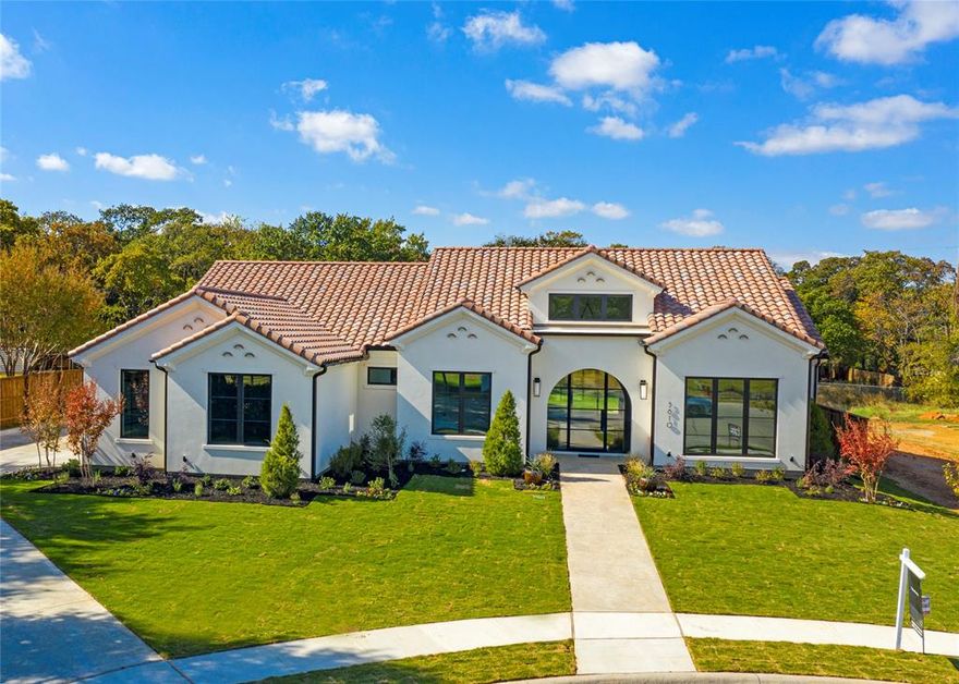 An exceptional one-story Modern Mediterranean. Gorgeous custom home with designer finishes throughout. Features include 17 ft grand foyer, custom iron front doors, floor to ceiling glass study door, & temperature control wine room. Hardwoods throughout, Chef's kitchen w SS Thermador appliances, Spacious Prep Pantry w-secondary dishwasher, sink, ice maker & built-ins, maser suite with spacious closet, dressing station and spa-like master bath. Game-Media room with built-ins, and sliding doors to backyard.  Private backyard with plenty of room for a pool. Covered patio with motorized screens, built-in grill, fridge, sitting area.