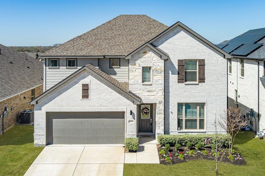 Stunning and Move-In Ready!  Step into an immaculate turnkey two-story home nestled in Melissa's sought-after Wolf Creek master-planned community. This exquisite 5 bedroom, 3 bathroom versatile home features an open floor plan complete with LVP flooring, fresh neutral paint & media room. The spacious eat-in kitchen boasts stunning white cabinetry, stainless steel appliances, breakfast bar & gas cooking. Primary suite offers dual sinks, oversized shower & walk-in closet. Guest bedroom downstairs. Secondary living space, media room, 3 bedrooms & full bathroom on second floor. The  PRIVATE back yard retreat is complete with covered patio. Separate utility room & 2 car garage complete the home. Walking distance to schools. Minutes from the new new Walmart, HEB and restaurants. Easy commute routes to HWY 75.