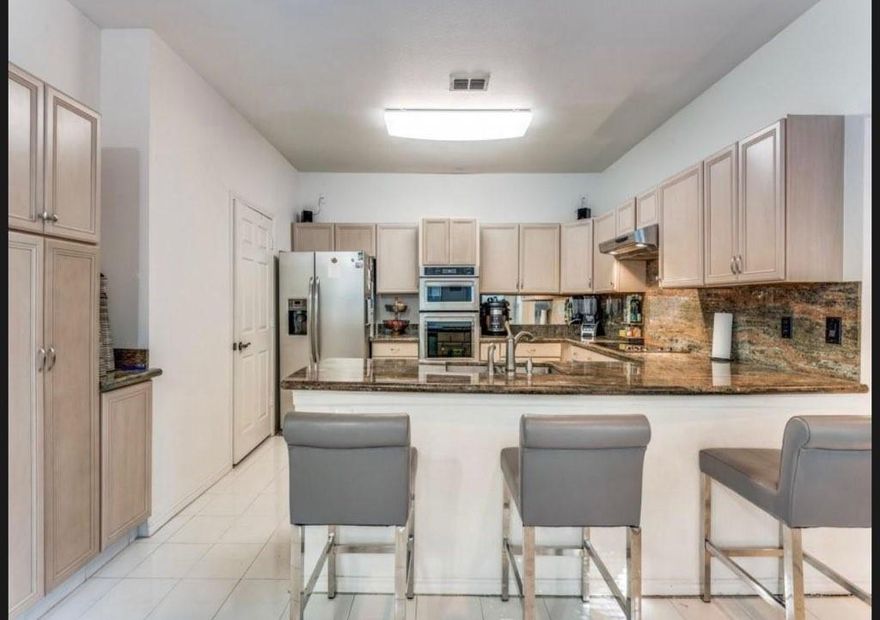Beautifully maintained 3 bedroom, 3 bath home in a desirable Far North Dallas community with top-rated schools. Light-filled and functional floor plan with spacious living area, fireplace, and rare full bath for each bedroom. Downstairs bedroom with adjoining full bath offers flexibility for guests or home office. Kitchen opens to living space and features granite countertops, ample cabinetry, and breakfast bar. Neutral finishes throughout create a move-in-ready feel. Enjoy mature trees, charming curb appeal, 2 car garage, community pool, and well-kept common areas. HOA maintains grass area and provides water for lawn care. Minutes from shopping, dining, and major highways. Buyer and buyer’s agent to verify all information.